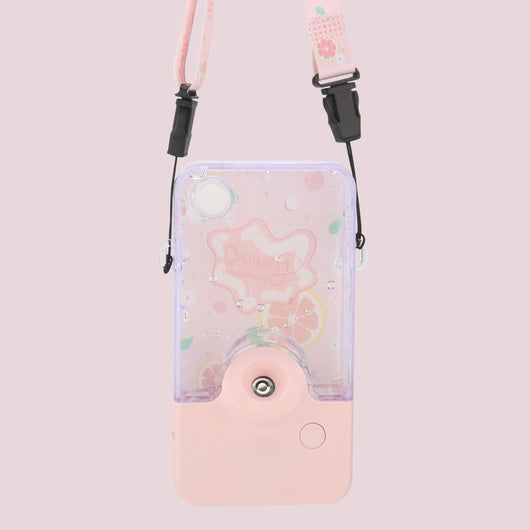 Pink and clear portable handheld humidifier with a fruit pattern, mist nozzle, and a matching pink neck lanyard. - Image 4