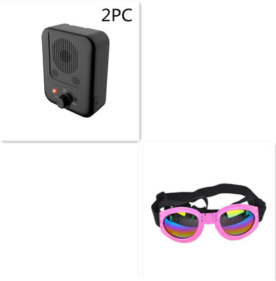 Black ultrasonic anti-barking device with a red light and a control knob, next to yellow pet goggles with rainbow lenses. - Image 12