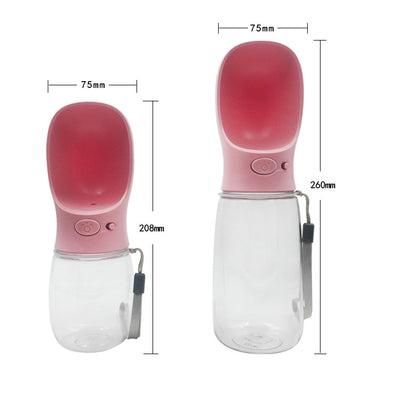 White portable pet water bottle with a clear reservoir and built-in drinking bowl, shown in a bag. - Image 22