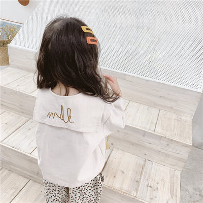 Camisa infantil con solapa grande y bordados - Image 9