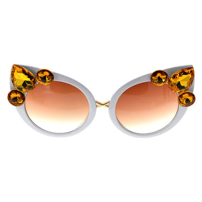 White cat-eye sunglasses with brown gradient lenses, adorned with clear and amber rhinestone flowers and bees. - Image 5