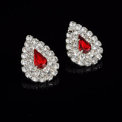 Sparkling bridal necklace and matching teardrop rhinestone earrings set on a black background. - Image 2