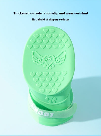 Four yellow silicone dog booties with a cartoon dog face emblem and "LUCKY" strap on a light blue background. - Image 13