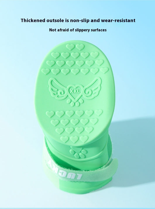 Four yellow silicone dog booties with a cartoon dog face emblem and "LUCKY" strap on a light blue background. - Image 13
