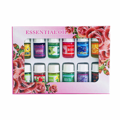 A 12-piece essential oil set in a decorative pink box with a rose floral design. Includes scents like Lavender, Rose, Lemon, and Green Tea. - Image 5