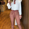 Conjunto Elegante: Blusa Blanca y Pantalón Estampado