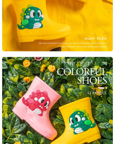 Bright yellow children's rain boots with a green cartoon dinosaur appliqué, designed for waterproof outdoor play. - Image 10