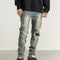 Jeans Slim Fit con Detalles de Tinta Salpicada y Parches Rotos