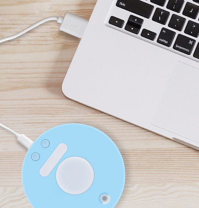 White round portable USB humidifier with a night light, single fog outlet, and two control buttons. - Image 12
