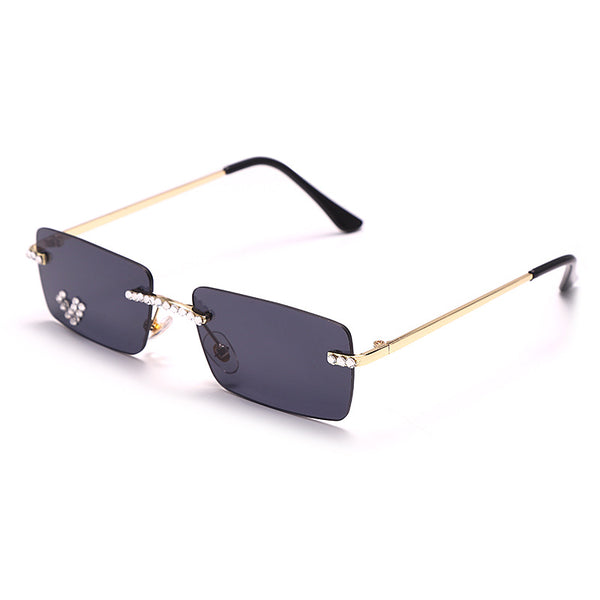 Gafas de Sol Modernas sin Marco con Detalles Metálicos