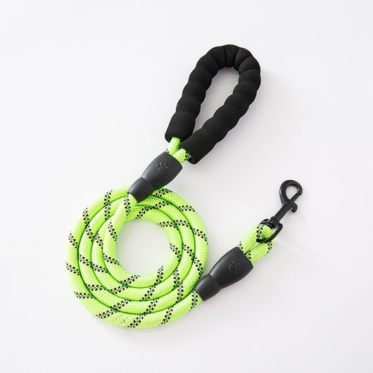 Red and black dog harness with reflective strips, adjustable straps, and a top handle for secure pet control. - Image 25