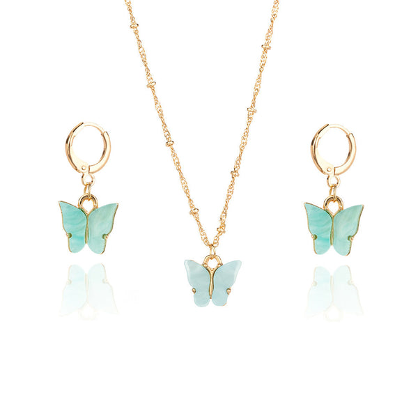 Pink acrylic butterfly necklace and earring set with gold-colored chain and hoop earrings. - Image 3