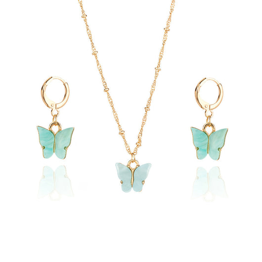 Pink acrylic butterfly necklace and earring set with gold-colored chain and hoop earrings. - Image 3