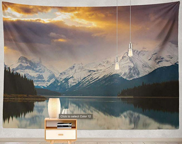 Printed polyester tapestry featuring a dramatic sunset over snow-capped mountains reflected in a calm lake.