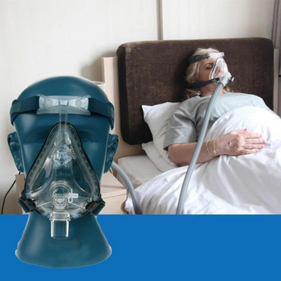 Clear full face oral and nasal mask with gray headgear displayed on a mannequin head for sleep therapy. - Image 4