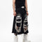Pantalón Cropped Roto con Parches Estilo Vintage