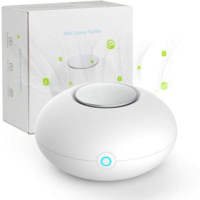 White mini ozone generator and air purifier with a round, compact design and a green indicator light.