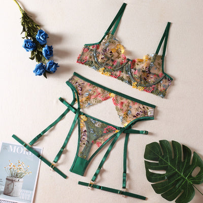 Yellow sheer floral embroidered lingerie set with a bra, thong, and two leg rings, laid flat. - Image 8