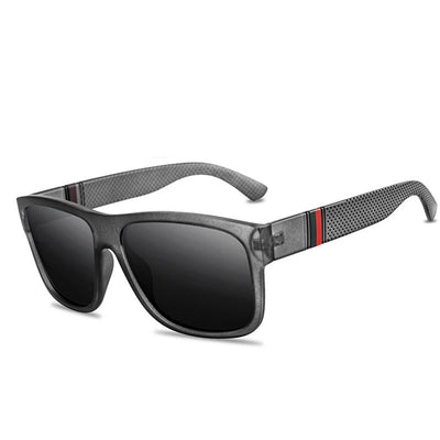 Men's grey plastic frame driving sunglasses with dark polarized lenses and red and black stripe detail on temples. - Image 27