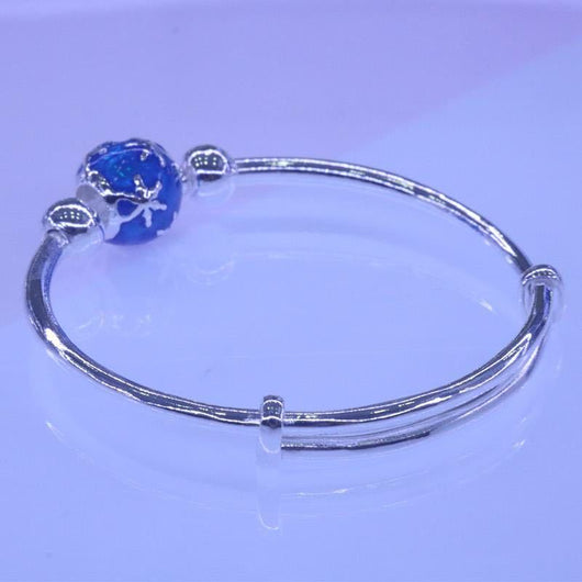 Pulsera Giratoria de Cobre con Cisne y Cuentas Plateadas - Image 7