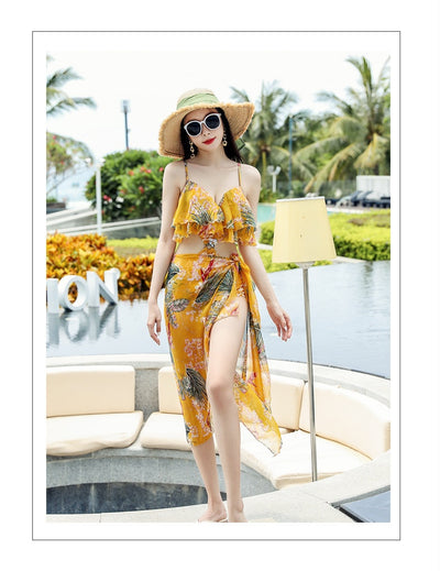 Pink tropical print three-piece women's swimwear set with ruffled bikini top, high-waisted bottoms, and matching sarong. - Image 22