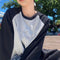 Blusa Holgada Unisex con Bordado en Mangas