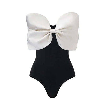 Black one-piece swimsuit with a white oversized bow detail at the tube top bust, perfect for summer. - Image 6