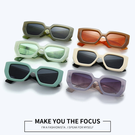 Beige square frame sunglasses with dark gray lenses, featuring a thick, fashion-forward design.