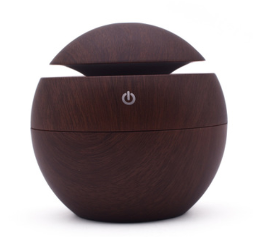 Black spherical ultrasonic atomizer with a power button icon, designed for aromatherapy and humidification. - Image 7