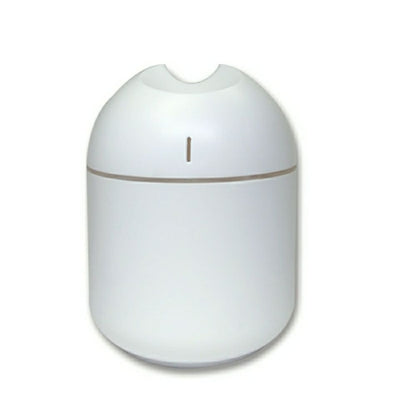 Pink aromatherapy humidifier with a minimalist design and a single mist outlet. - Image 5