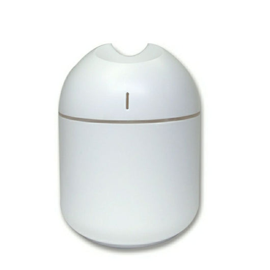 Pink aromatherapy humidifier with a minimalist design and a single mist outlet. - Image 5