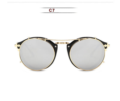 Round frame sunglasses with light blue mirrored lenses and a gold-tone metal frame, featuring a double bridge. - Image 8