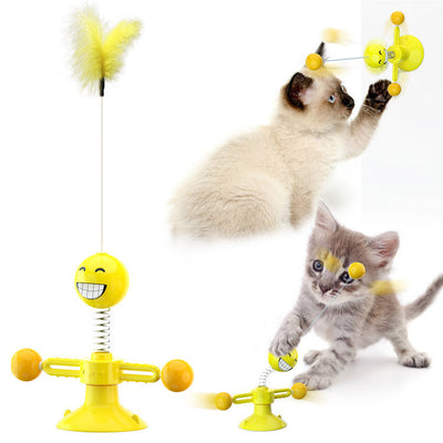 Yellow cat turntable windmill toy with a smiling face, spring, rotating arms, and a feather wand. Two kittens play with the toy. - Image 4