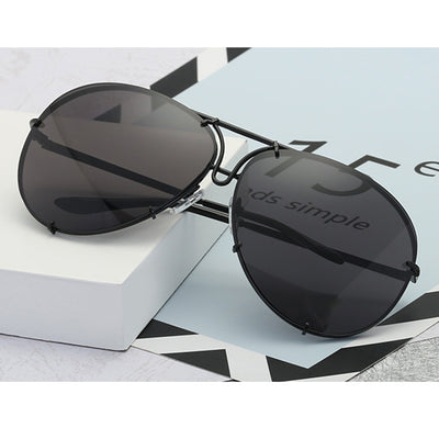 Aviator sunglasses with light blue lenses and a gold-colored metal frame, featuring a double bridge design. - Image 2