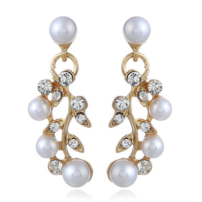 Gold-toned necklace and matching stud earrings set with vine-like design, adorned with white faux pearls and clear rhinestones. - Image 4