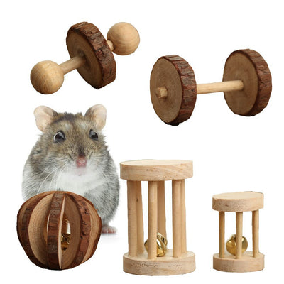 Set of natural wooden hamster toys including dumbbell shapes, a spherical bell toy, and two cylindrical bell toys, with a hamster.