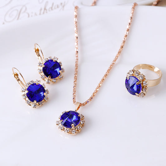 Juego de Joyería Cristal Redondo: Collar, Aretes y Anillo Elegante