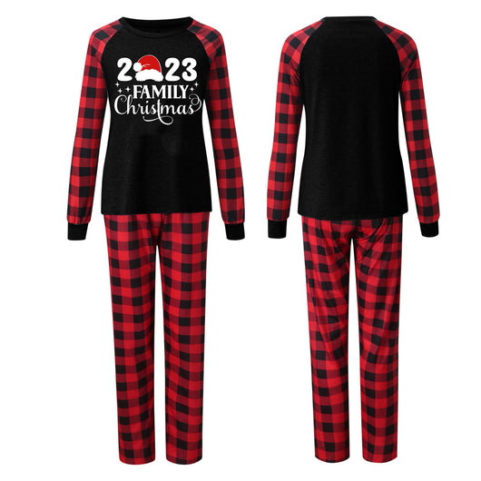 Red and black buffalo plaid Christmas pajama set with a long-sleeve top and matching pants. Top reads "2023 FAMILY Christmas". - Image 4