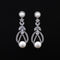 Aretes de Perla y Circón en Plata 925 y Oro Blanco
