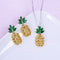 Conjunto de Aretes y Collar Piña Cristal con Árbol de Coco