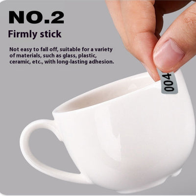 Roll of matte silver adhesive labels with sequential black serial numbers from 00001 to 00024 visible. - Image 6