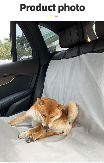 Pink car pet mat with white paw print and bone patterns, featuring black straps for securing to a rear seat. - Image 34