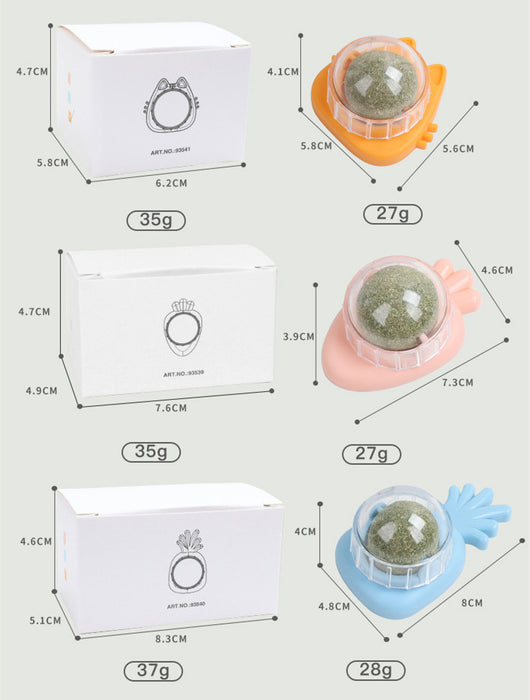 Orange carrot-shaped cat toy with a clear dome holding a rotating catnip ball, next to its white packaging box. - Image 15