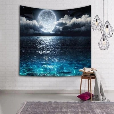 Wall tapestry featuring a full moon reflecting on a dark ocean with clear blue water in the foreground, creating a serene night scene.