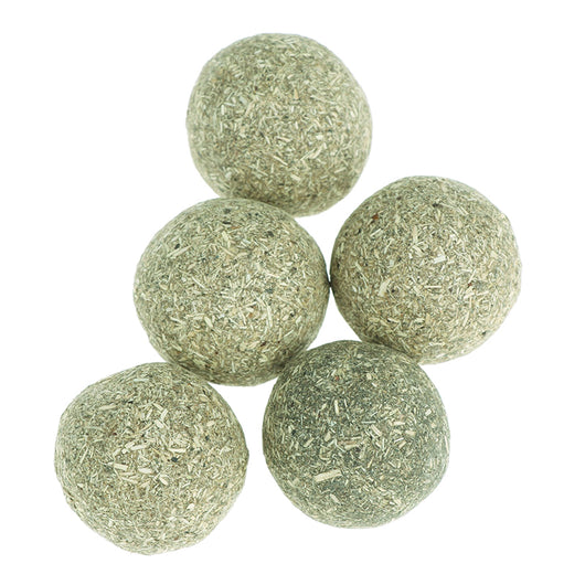 A hand holds a spherical catnip ball made of dried mint leaves and stems, light green and brown in color. - Image 5