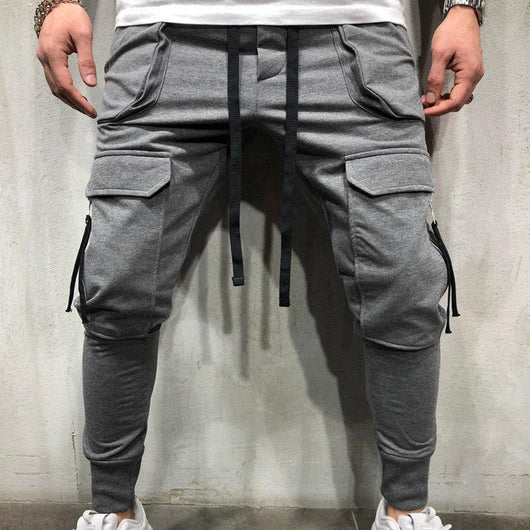 Pantalones deportivos slim fit con bolsillos de cierre - Image 6