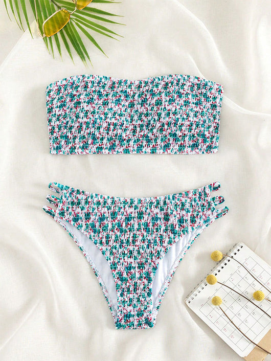 Floral smocked strapless bandeau bikini with high-cut bottoms featuring side straps, in white, teal, and red. - Image 9