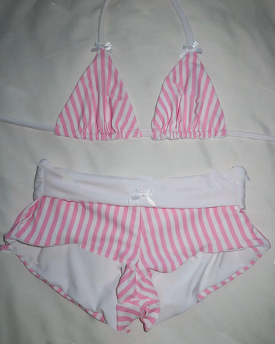 Red and white gingham high-waisted bikini set with triangle top, laid on sand under sunlight. - Image 10