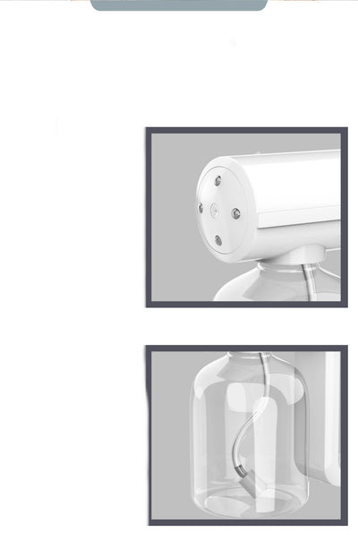 Black wireless alcohol blue light disinfection spray gun with clear reservoir, actively misting, on a marble surface. - Image 8