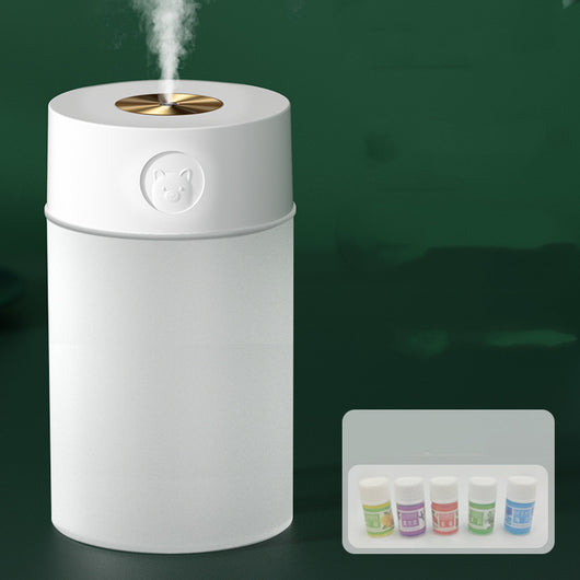 White cylindrical humidifier with a gold nozzle emitting mist, featuring a subtle bear emblem. Includes five aromatherapy oil bottles. - Image 8
